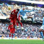 Haaland Breaks Records as Liverpool and Manchester City Share Points in EPL Showdown