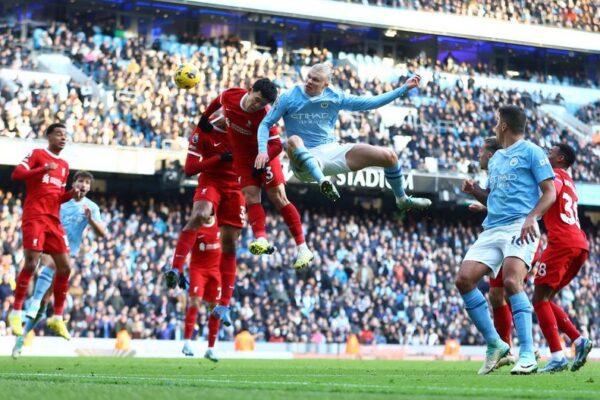 Haaland Breaks Records as Liverpool and Manchester City Share Points in EPL Showdown